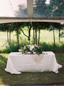 Outdoor tented wedding in Ontario photographed by Niagara wedding photographer Kayla Yestal, as featured on Style Me Pretty. www.kaylayestal.com