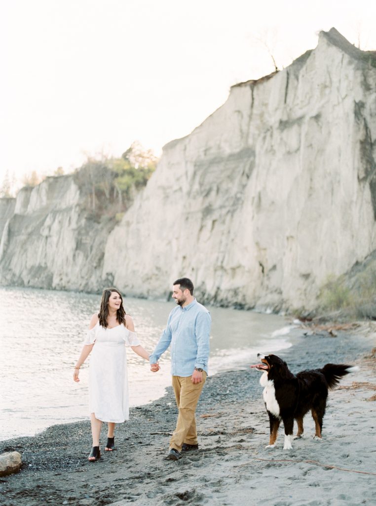 Katie and Justin's Scarborough Bluffs Engagement Session with Bernese Mountain Dog, Sadie | White off-shoulder lace dress engagement session | Kayla Yestal | Bernese Mountain Dog Puppy | Toronto Engagement Session | Toronto Wedding PhotographerKatie and Justin's Scarborough Bluffs Engagement Session with Bernese Mountain Dog, Sadie | White off-shoulder lace dress engagement session | Kayla Yestal | Bernese Mountain Dog Puppy | Toronto Engagement Session | Toronto Wedding Photographer