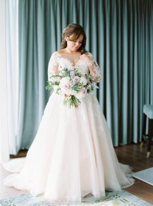 Elora Mill Wedding photographed by Elora wedding photographer Kayla Yestal | Ontario Fine Art Wedding Photographer | Allure Bridals Lace Wedding Dress | Medium Length Wedding Hairstyles | Soft Purple Bridal Bouquet | Light Purple Wedding Inspiration | Elora Mill Solarium Suite