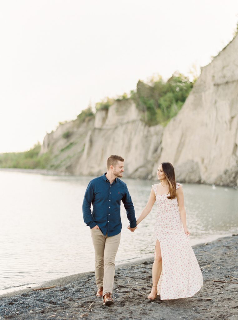 Scarborough Bluffs Engagement Session with a floral white maxi dress | Engagement Session Outfit Inspiration | Floral Dress Engagement Session | Toronto Fine Art Wedding Photographer Kayla Yestal www.kaylayestal.com