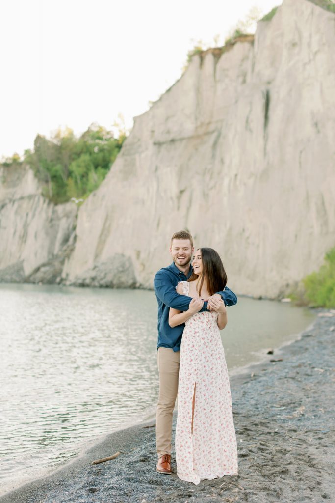 Scarborough Bluffs Engagement Session with a floral white maxi dress | Engagement Session Outfit Inspiration | Floral Dress Engagement Session | Toronto Fine Art Wedding Photographer Kayla Yestal www.kaylayestal.com