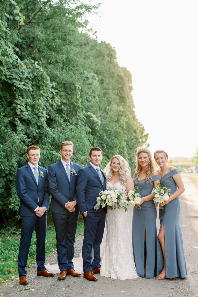 Honsberger Estate Wedding | Niagara on the Lake Wedding Photographer | Niagara Winery Wedding Venues | White and Green loose bridal bouquet by Bloom and Co | Slate blue bridesmaid dresses | Dessy bridesmaid dresses | Niagara wedding photographer Kayla Yestal www.kaylayestal.com